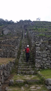Descending the steep steps at Intipata